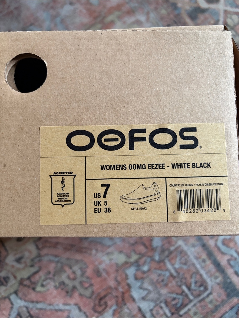 OOFOS Women’s OOMG Eezee Slip-On in White and Black